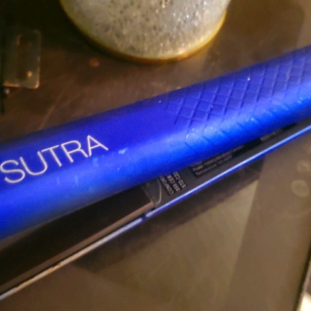 Sutra blue hair flat iron tool used